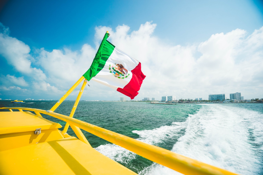 boat with mexico flag in cancun sp